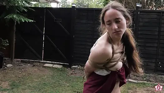 Half-stripped, Bell-jingling Slave Mila Drooling Through Tongue Clamp Is Made to Walk Outdoor Fountain Laps with Crotch Rope Saw
