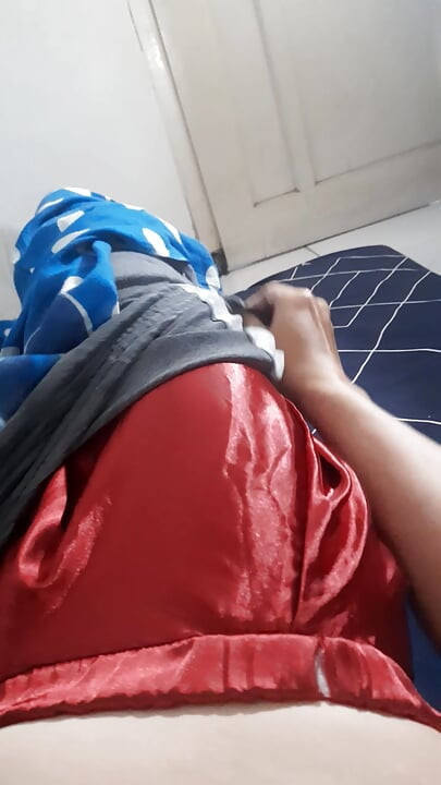 Wearing satin mini skirt inside shorts