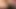 Horny Latina masturbates on the couch with a huge dildo