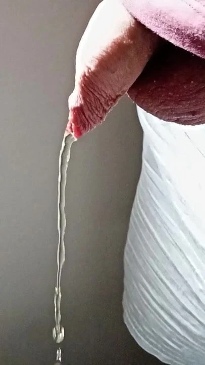 Uncut foreskin peeing