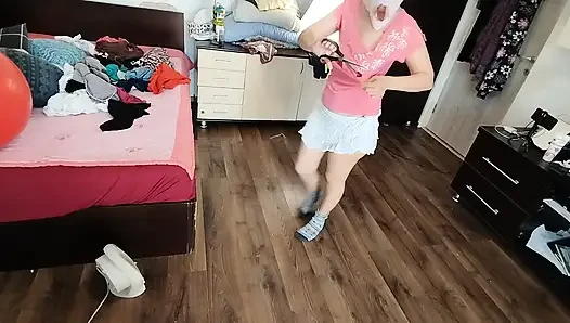 Amateur wife enjoys trying on clothes and cutting them.