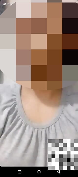shows off her big natural breasts, in a video call