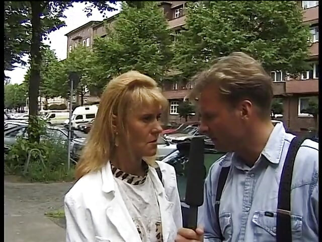 Blonde milf giving an interview