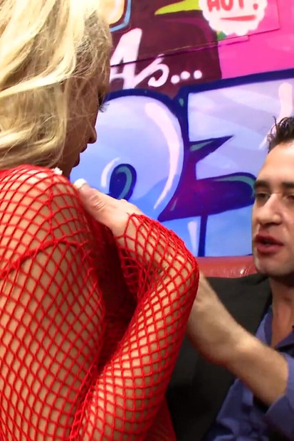 Blonde babe in red fishnets gets cum in mouth after fucking
