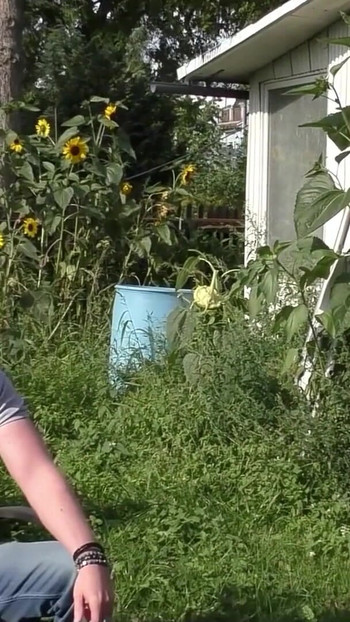 Iconic moment from "Real Outdoor Garden Gangbang with Big Boobs German Mature Dacada and Strangers"