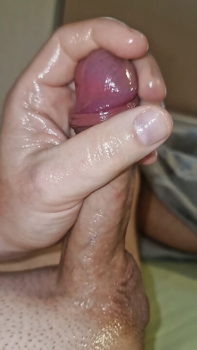 Oiled up_ jerking off big cock_huge cumshot