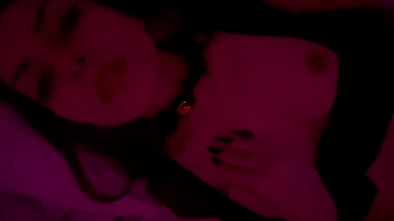 Real Couple Intimate Moment Under Red Lights