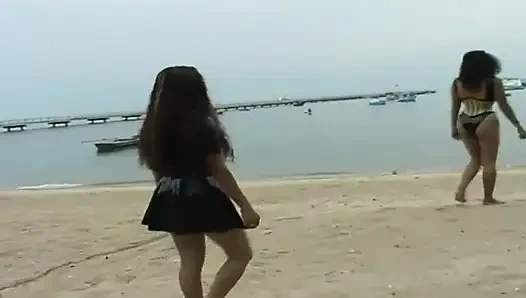 2 sexy Latina's presenting latex fetish in the pool and on the beach