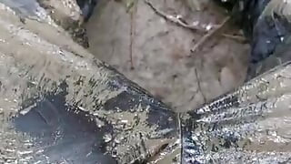 Horny wanking in a dirty rain suit