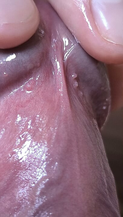 Close up cock head slow edging