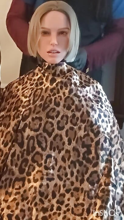 Jennifer haircutting cape modeling session