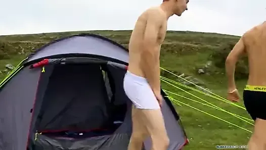 Two straight friends playing with their cocks at the camping