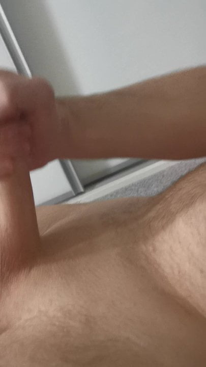 Wanking big white uncut cock till cum shot