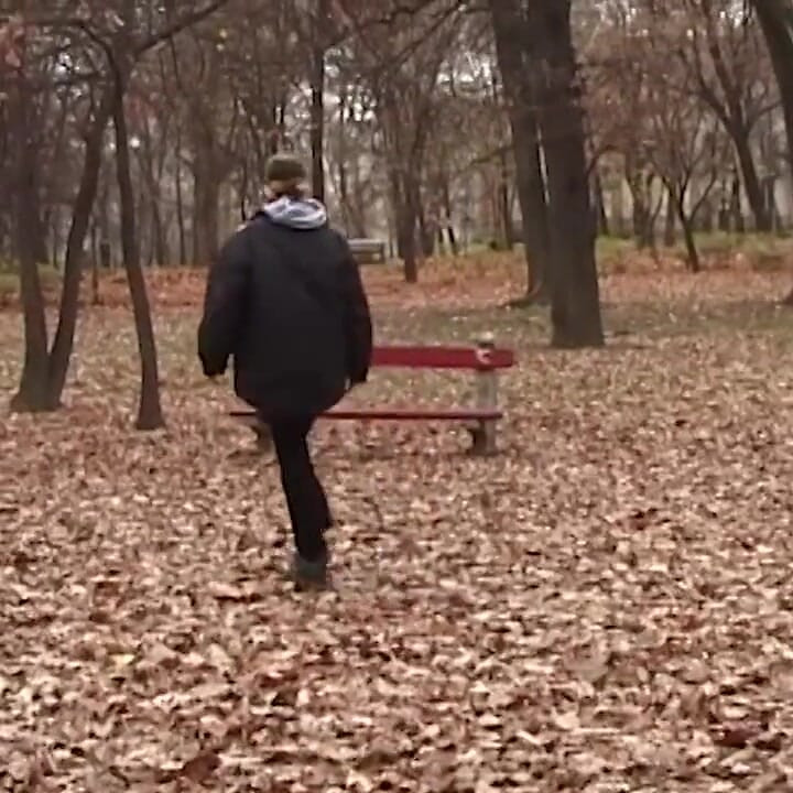 Young chick peeing in the park