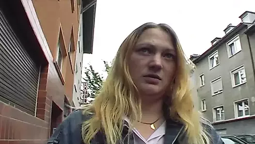 A chubby German slut with blonde hair riding a long pecker