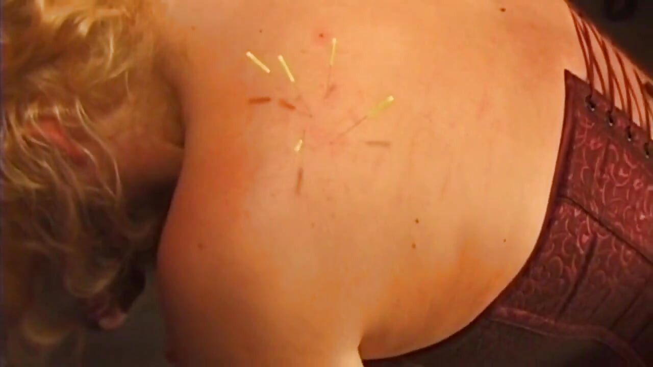 Busty Blonde MILF Submits to Intense Needle Play