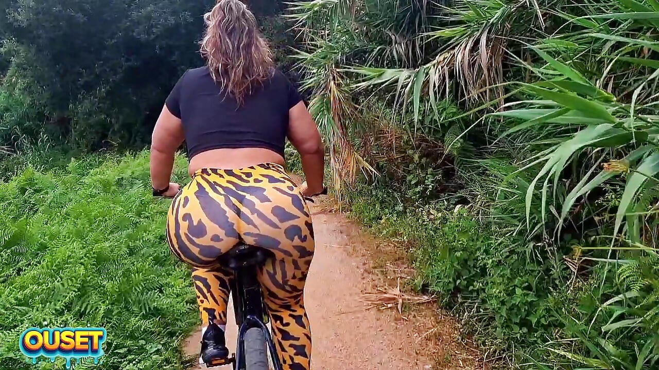 Big ass in tight leggings rides through the woods on a bike and ends up sucking and fucking outdoors with her huge ass
