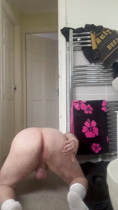 Caged slave spanking its self