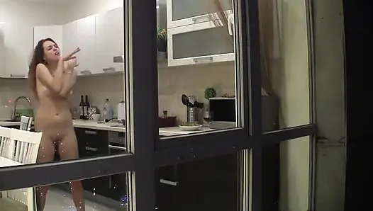 Redhead Amateur Doesn't Know That She Is Being Watched While Dancing in the Kitchen