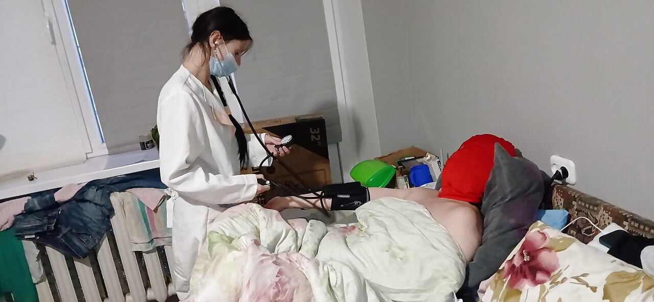 Lesbian threesome between two patients and a doctor