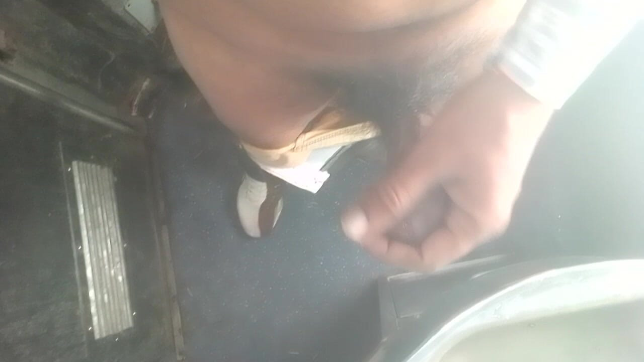 Young boy shaking his on a train