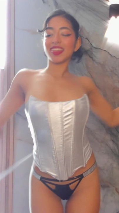A very sensual dance, I turn and slowly remove my bra. Do you like my small breasts?
