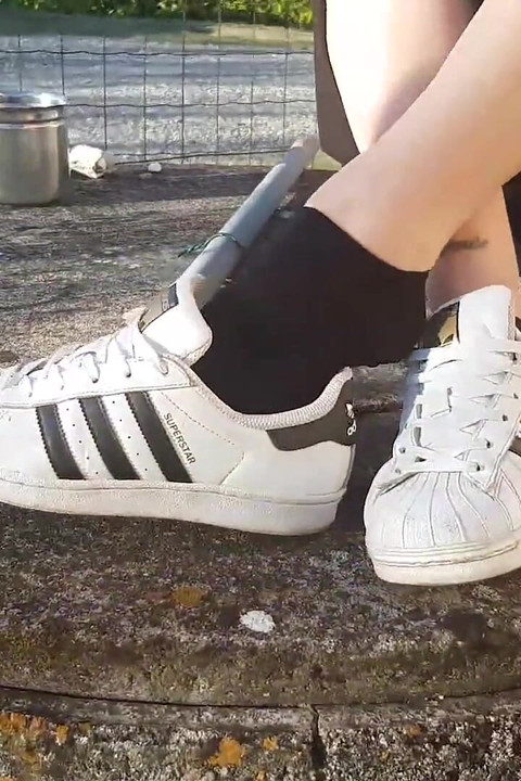 Petra smokes her ciggaretes outdoor