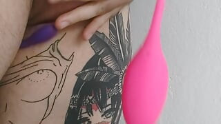 Playing with vibrator on the penis