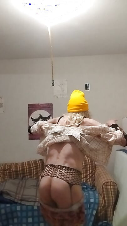 The blonde in the yellow cap shows off all excited...!! ...