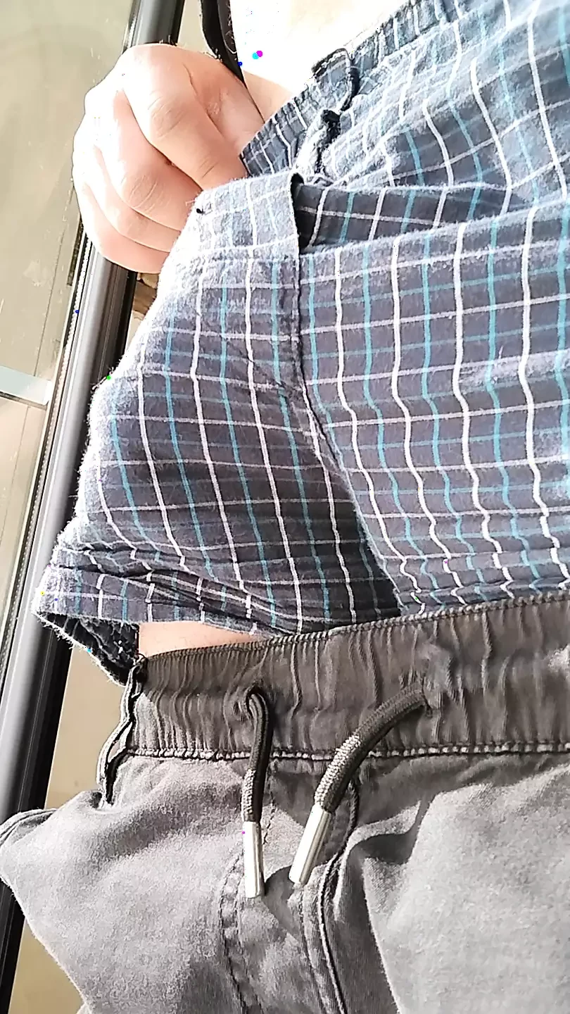 My neighbor likes me to masturbate my big cock at the window