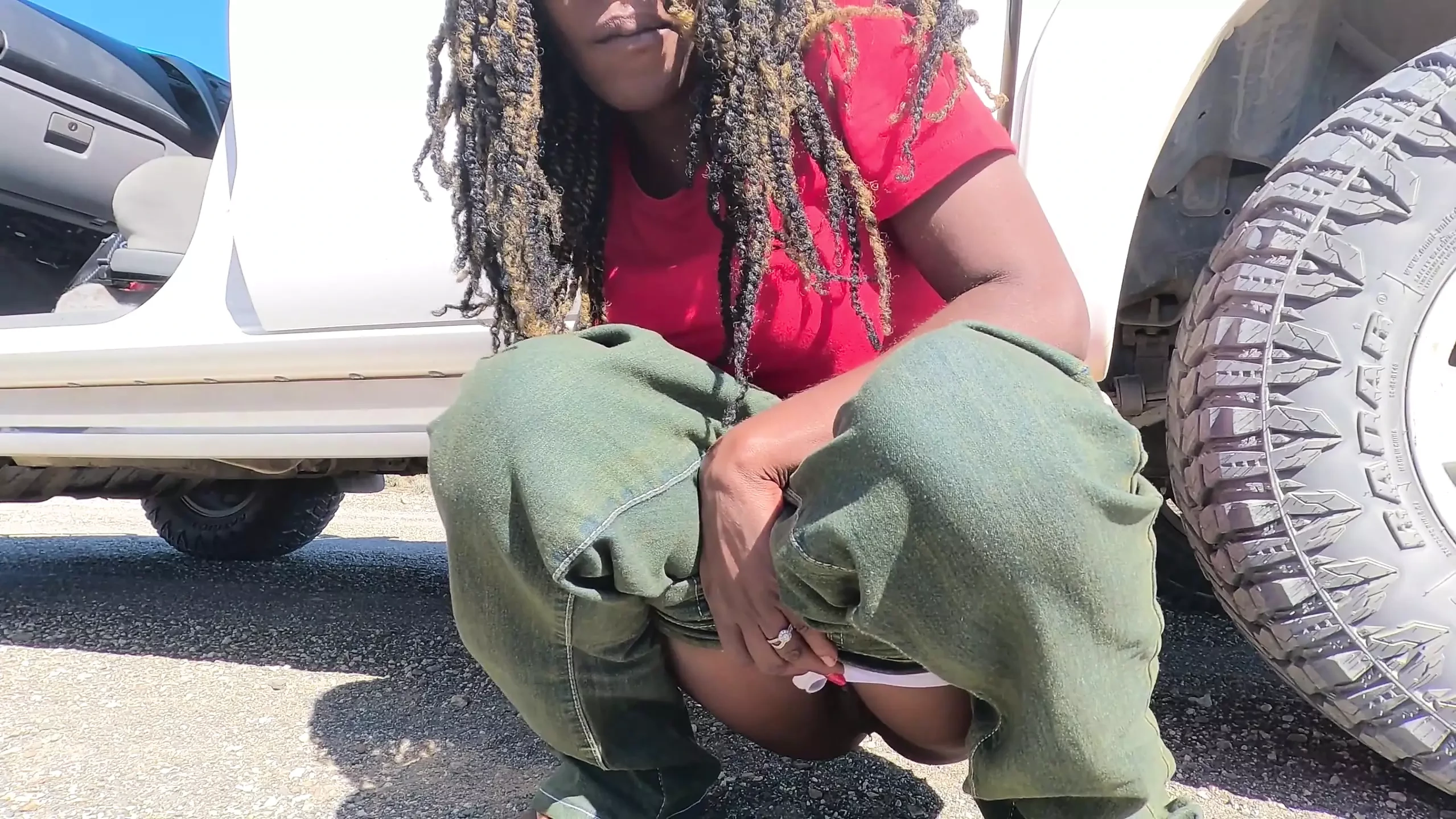 Ebony MILF Taking a Piss Next to the Road and Gets Hubby to Lick Her Pussy Clean After