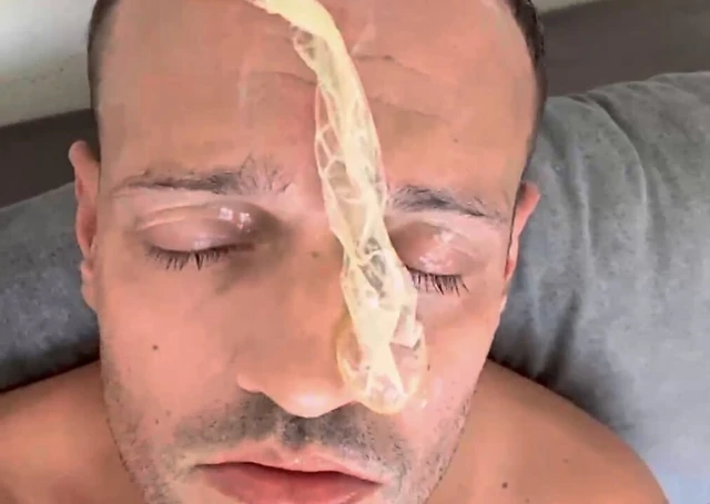 Condom emptied on my face