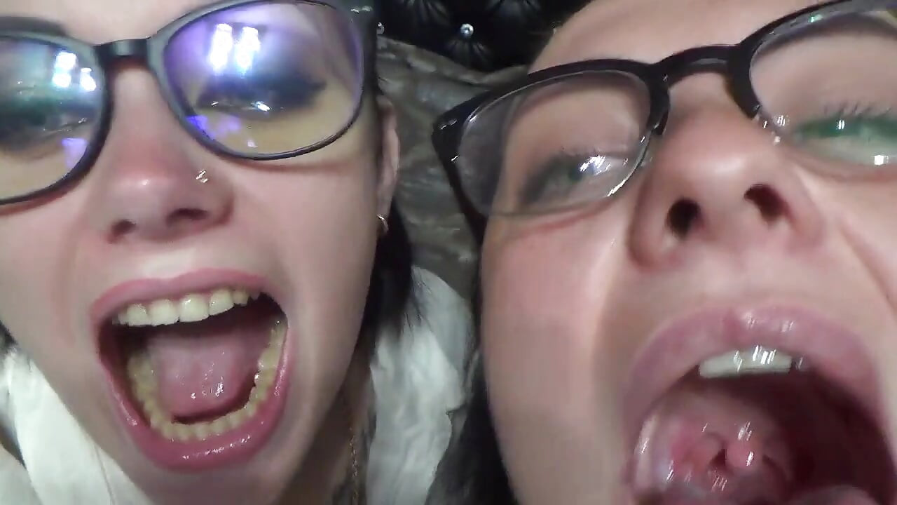Two business women taunt you with their mouths & tongues before eating you whole!