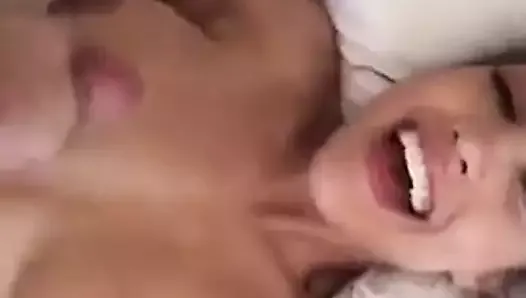 Woman recording herself getting a cum facial