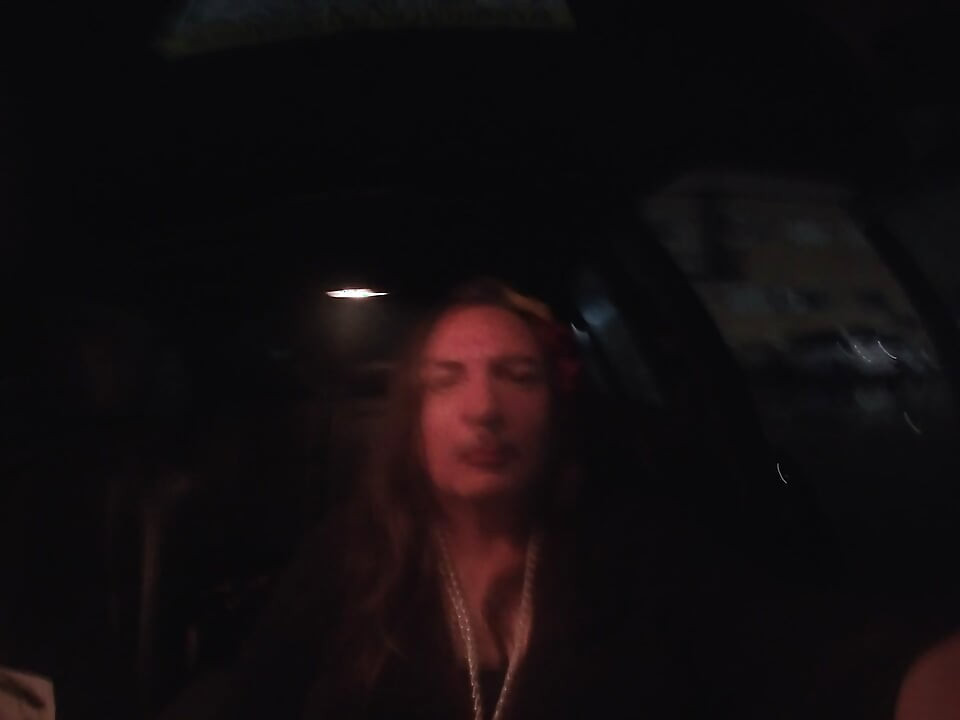 Mature sissy CD out in the rain in A parking lot in public masturbation.