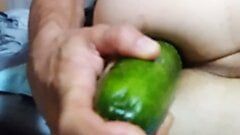 Anal playing with massive cucumber