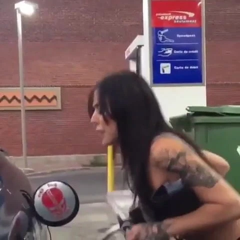 Woman at gas station