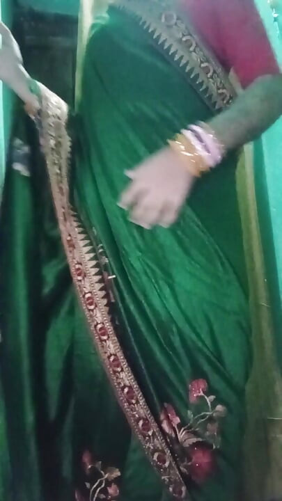 Indian Gay Crossdresser Gaurisissy in Green Saree Pressing Her Big Boobs and Fingering in Her Ass