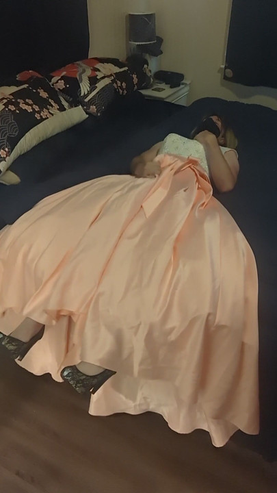 Enjoying a cuteute pink satin prom dress in bed | Clip 1