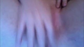 Readhead girl masturbating on bed