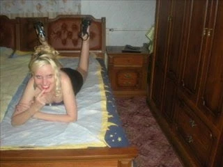 Blonde girl in black (pictures)
