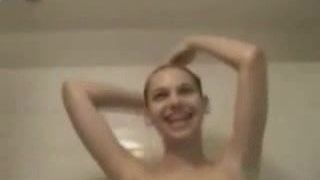 Amateur girl with GREAT boobs in shower.