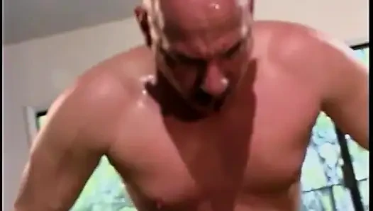 Brunette MILF with massive tits gets drilled by two studs