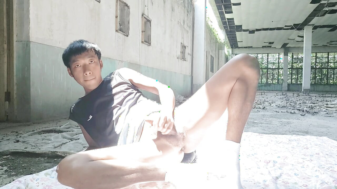 Cute Asian boy masturbates, moaning, ejaculating, and consuming fluids in a dreamlike light and shadow environment