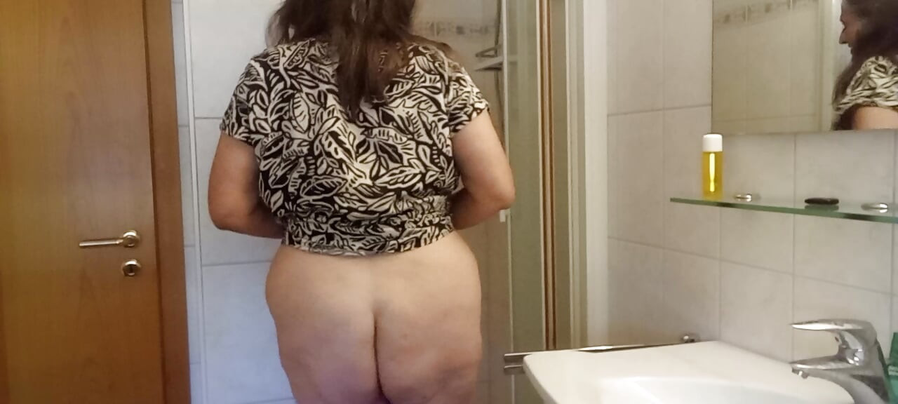 Fat woman gets really wet  hot shower show