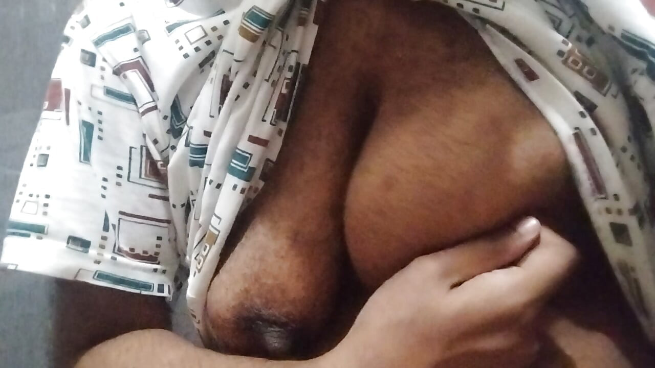 Busty Indian babe playing with her boobs and pussy while peeing
