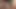 A passionate and seductive woman’s pubic area, adorned with luscious foliage.