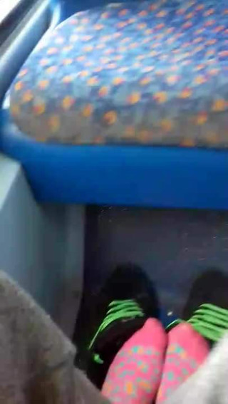 His stinky pink socks on the bus tease