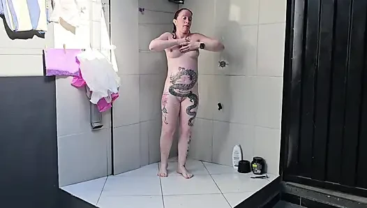 PREGNANT WOMAN SHAVES AND SHOWERS SHOWING HER PUSSY