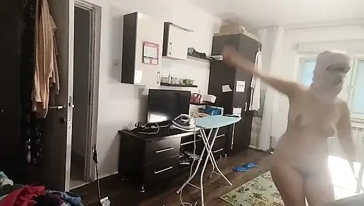 Sexy Brunette Doing Naked Chores Around the House